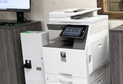 Library printer against a wall.